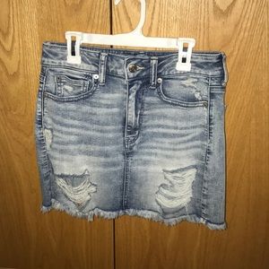 Distressed denim skirt